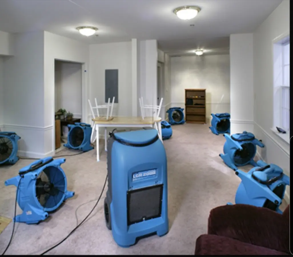 Air movers and dehumidifier setup for Water Damage Restoration in East Lake